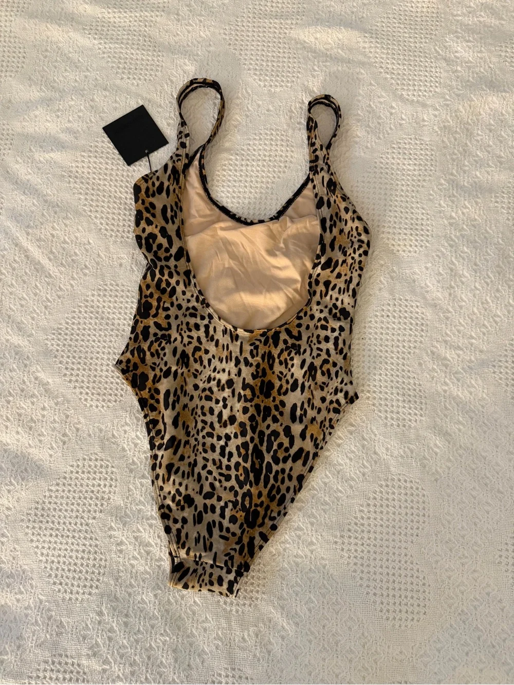 Source Unknown sleek leopard